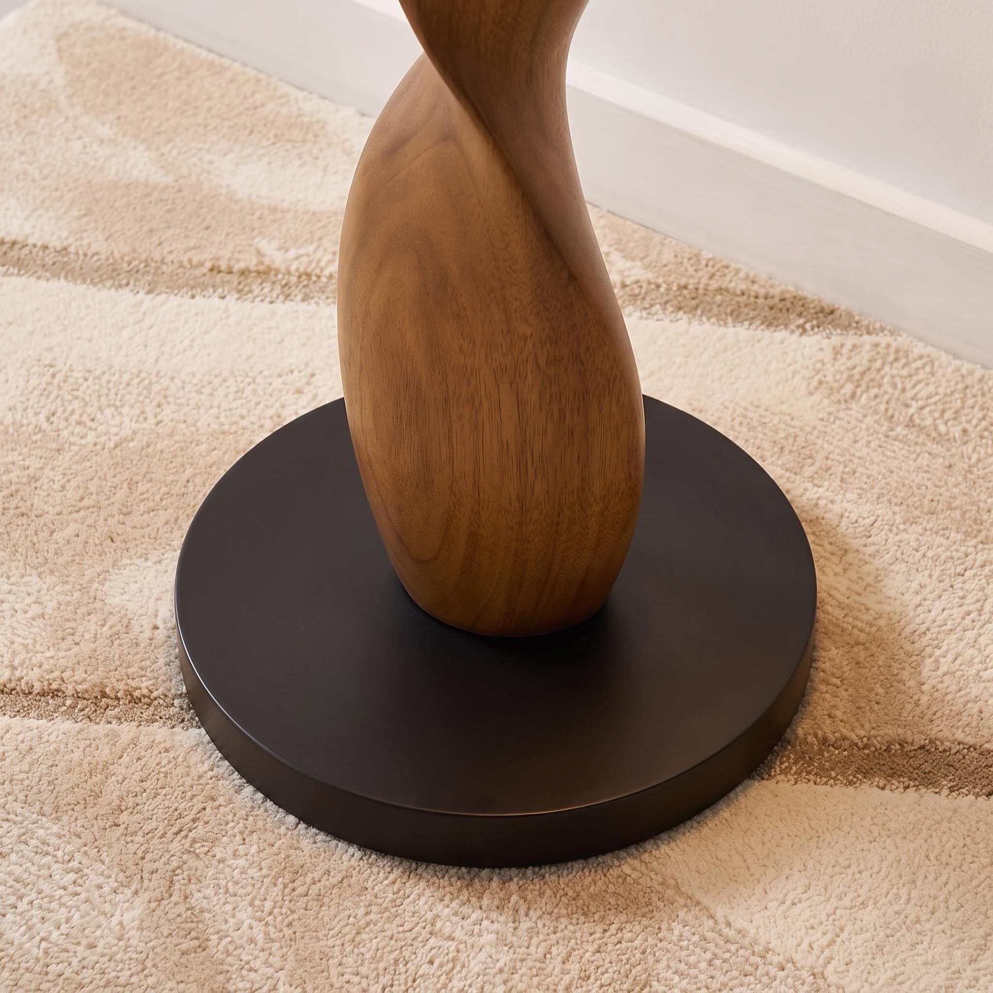 Low-Profile Dark Metal Base Disc Providing Contemporary Grounding Contrast