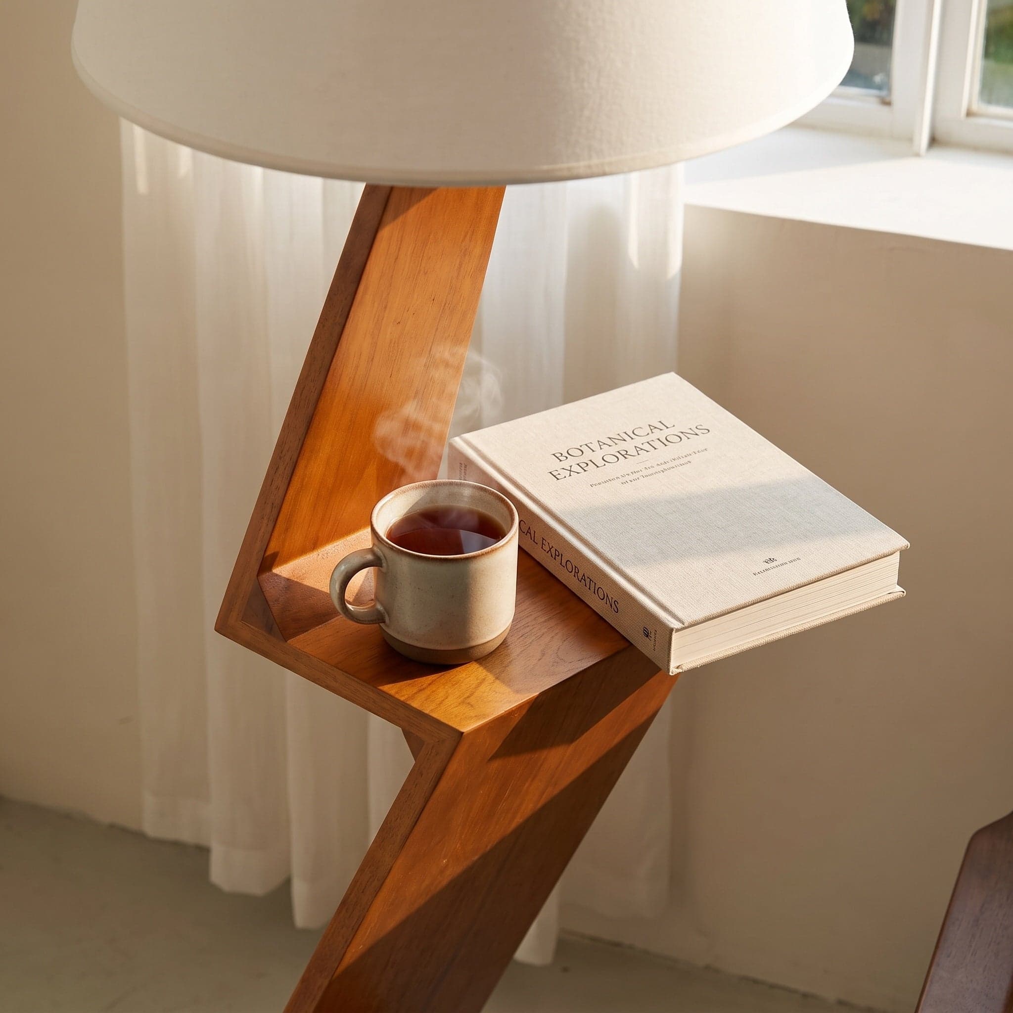 Close-Up of Integrated Solid Wood Display Shelves with Books and Accents