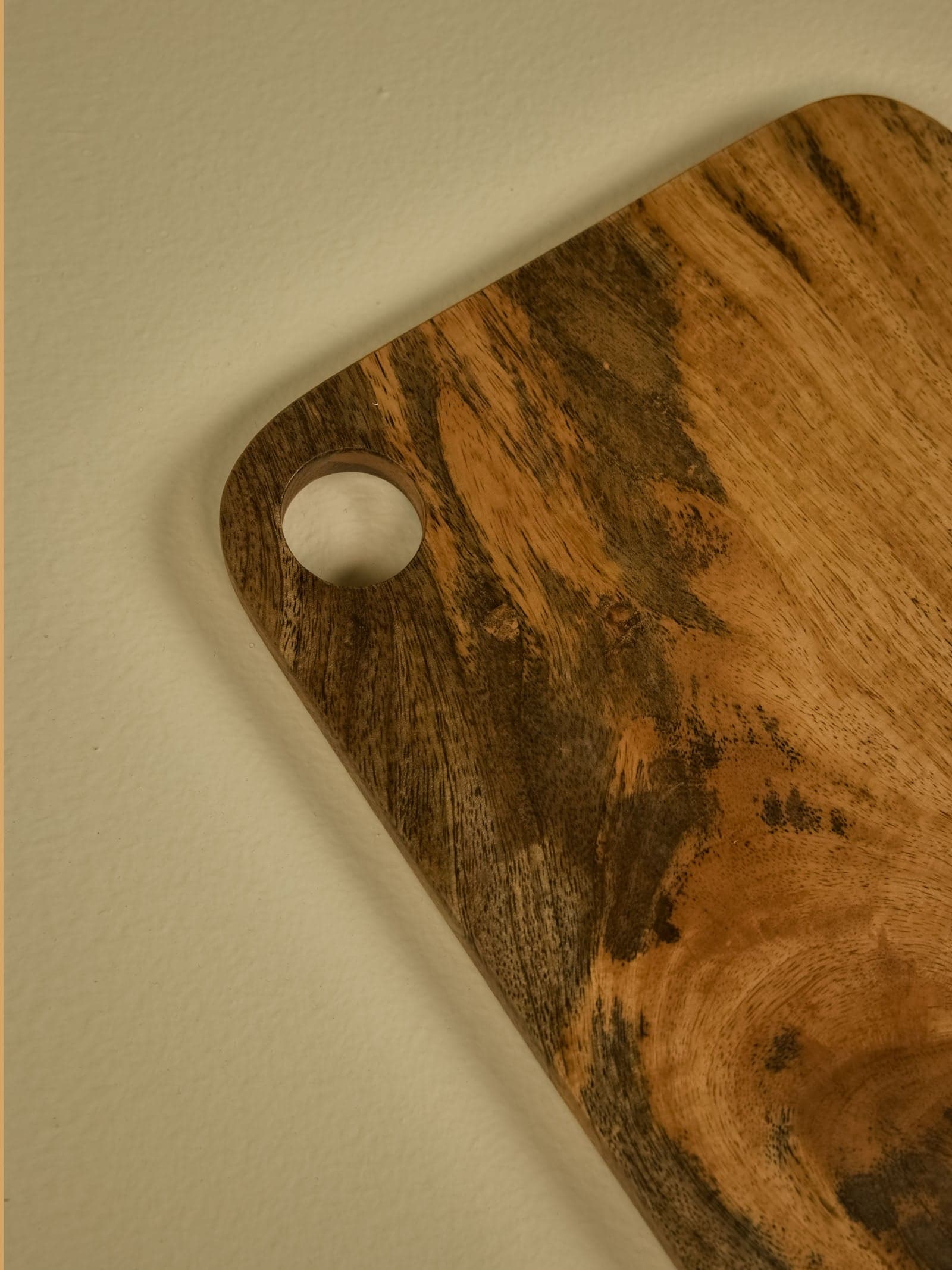 Macro Close-Up of Artisan Board Beveled Edge and Natural Timber Knots
