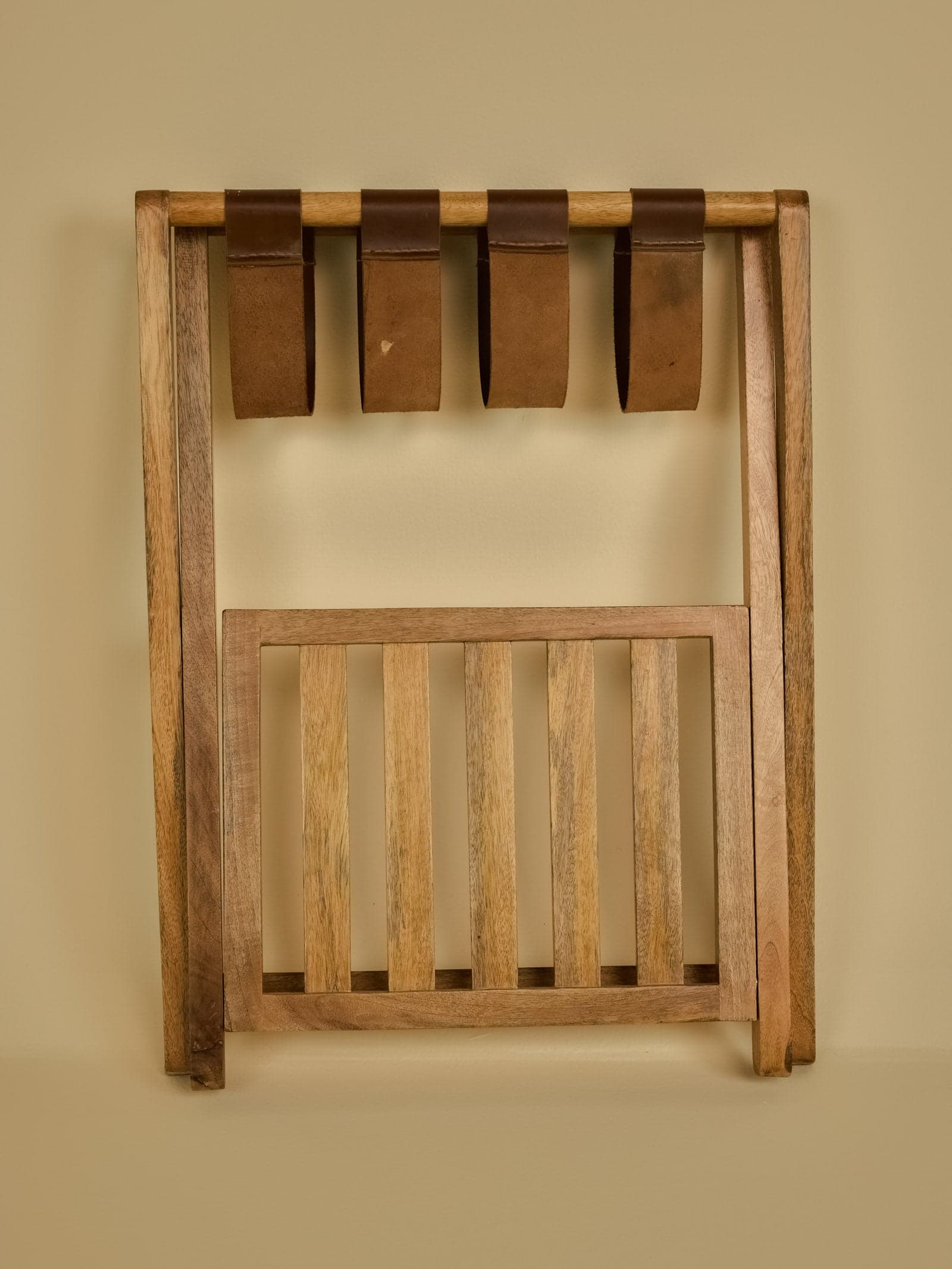 Luggage Rack Styled with Leather Suitcase in Guest Bedroom