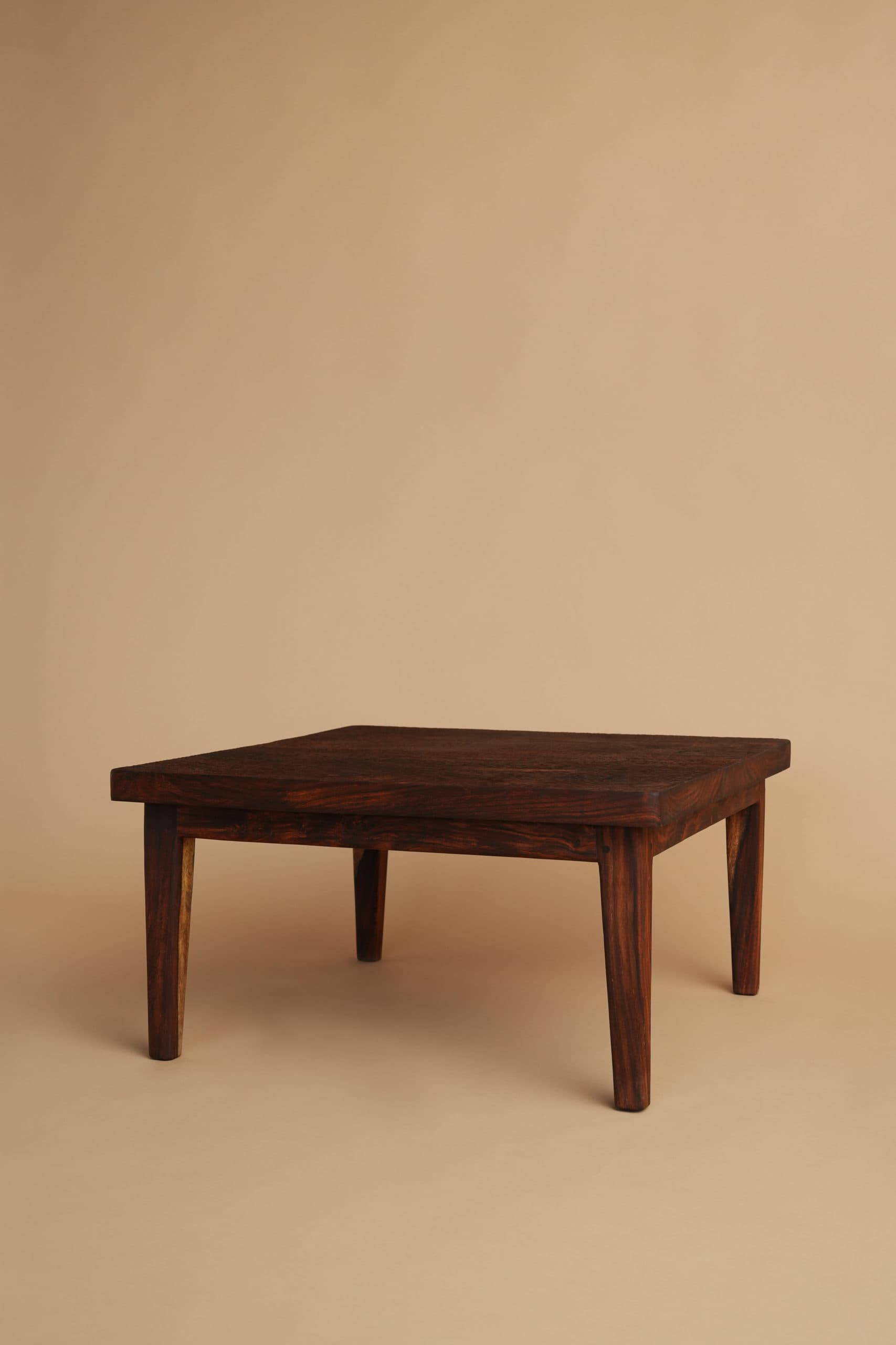 Onirique Hand-Carved Sheesham Coffee Table - Pedestal & Angle
