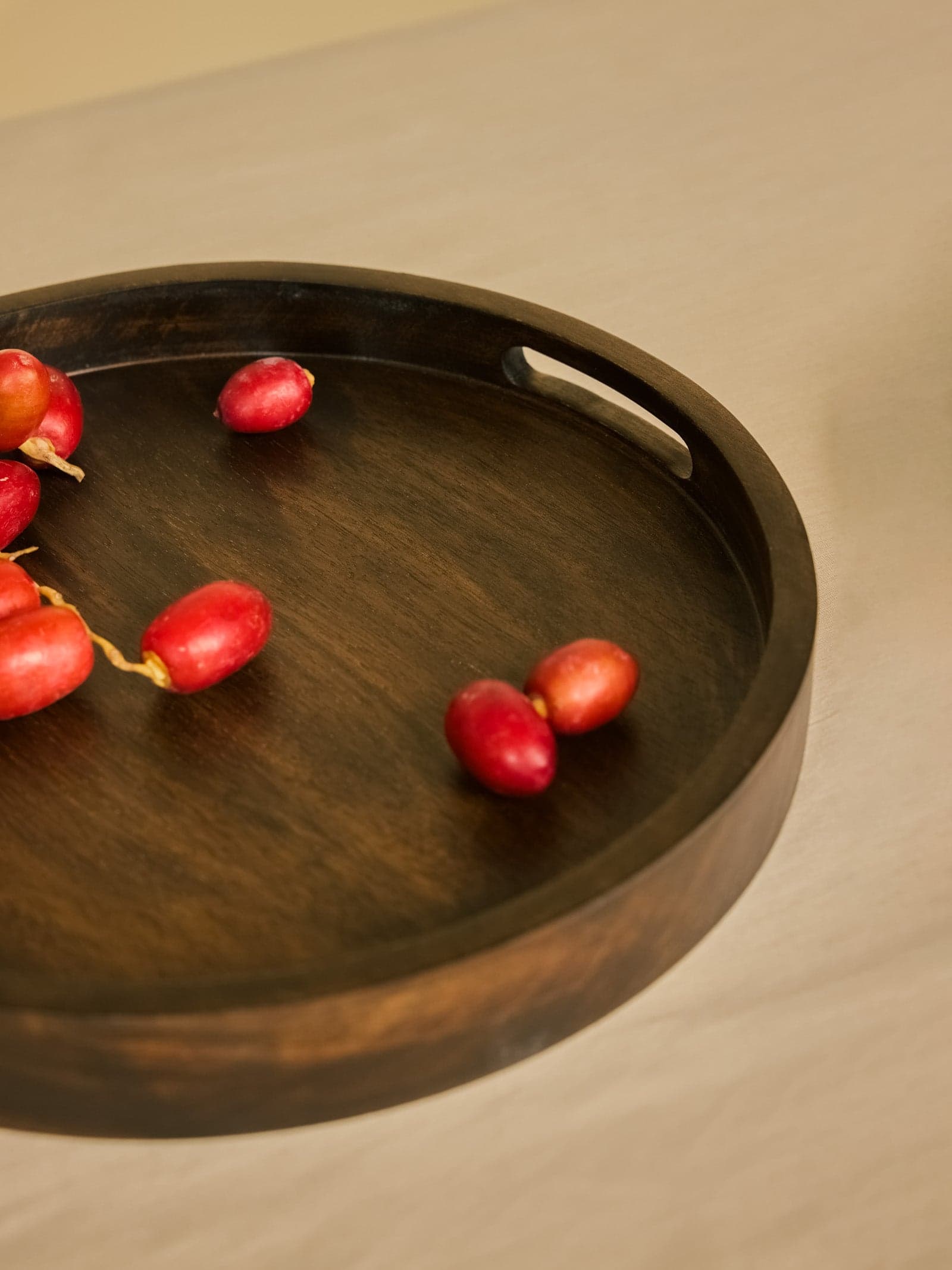 Round Wooden Serving Tray showing Raised Lip and Cutout Handle
