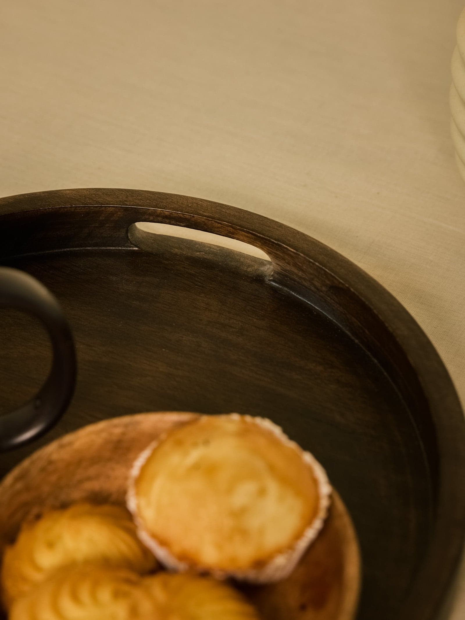 Angle View Showing Depth and Curved Rim of Round Tray