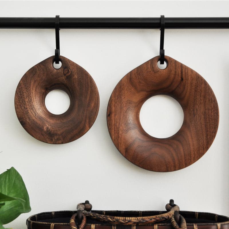 Cutout Solid Walnut Trivet on Modern Kitchen Countertop with Hot Cookware