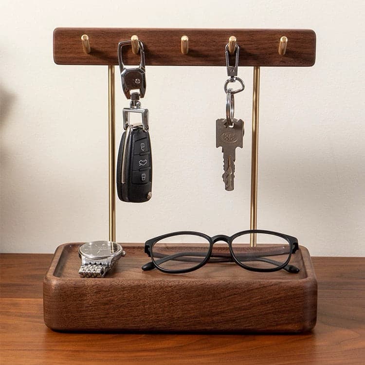 Studio Elevation of Five Brass Pegs and Carved Walnut Valet Tray