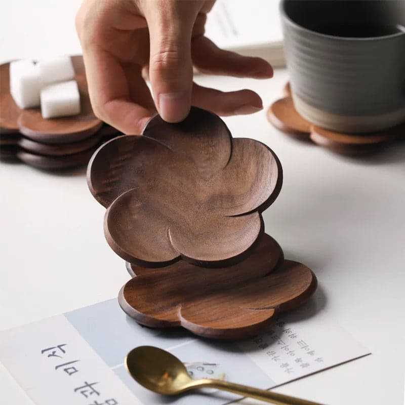 Little Flower Solid Walnut Coaster Set of 4 with Iced Drink on Marble Table