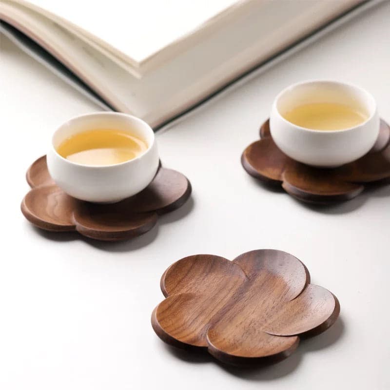 Stacked Set of 4 Botanical Coasters Displaying Flowing Wood Grain Variations