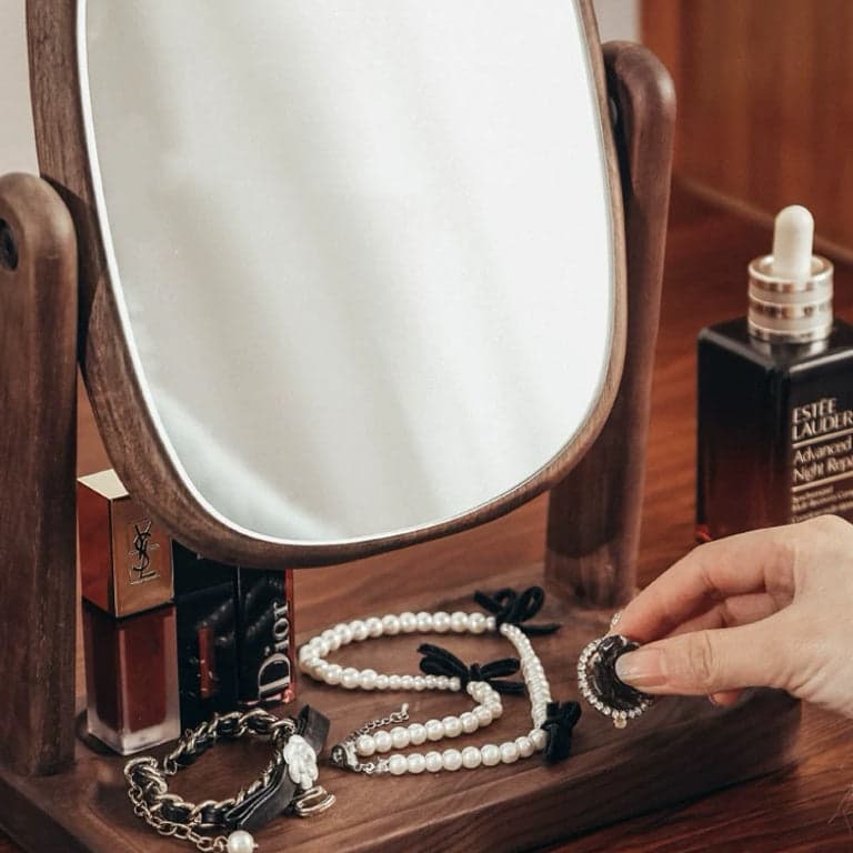 Side Angle Showing Pivot Geometry and Integrated Jewelry Catchall Tray