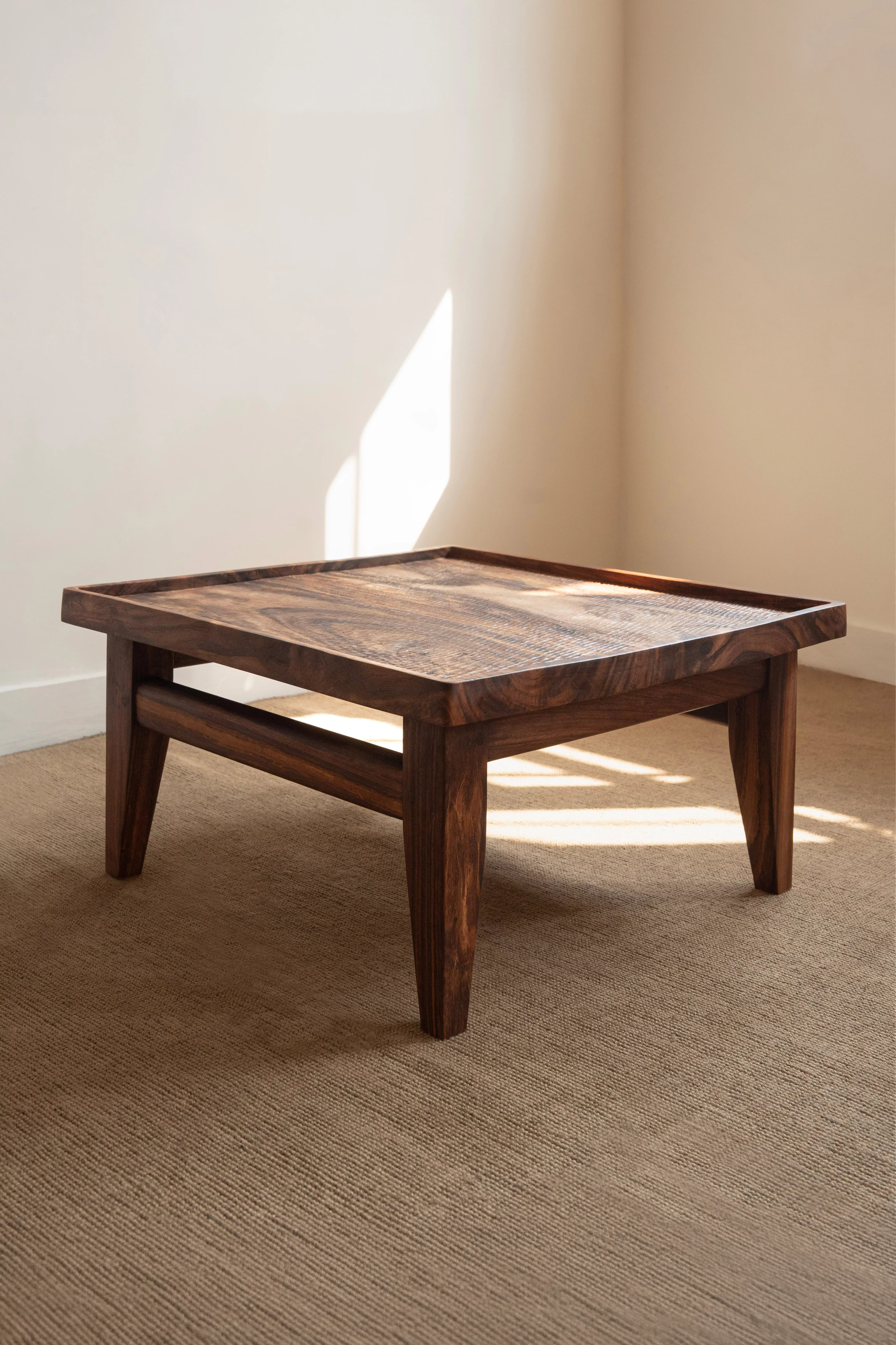 Ido Hand-Carved Sheesham Coffee Table - Studio View